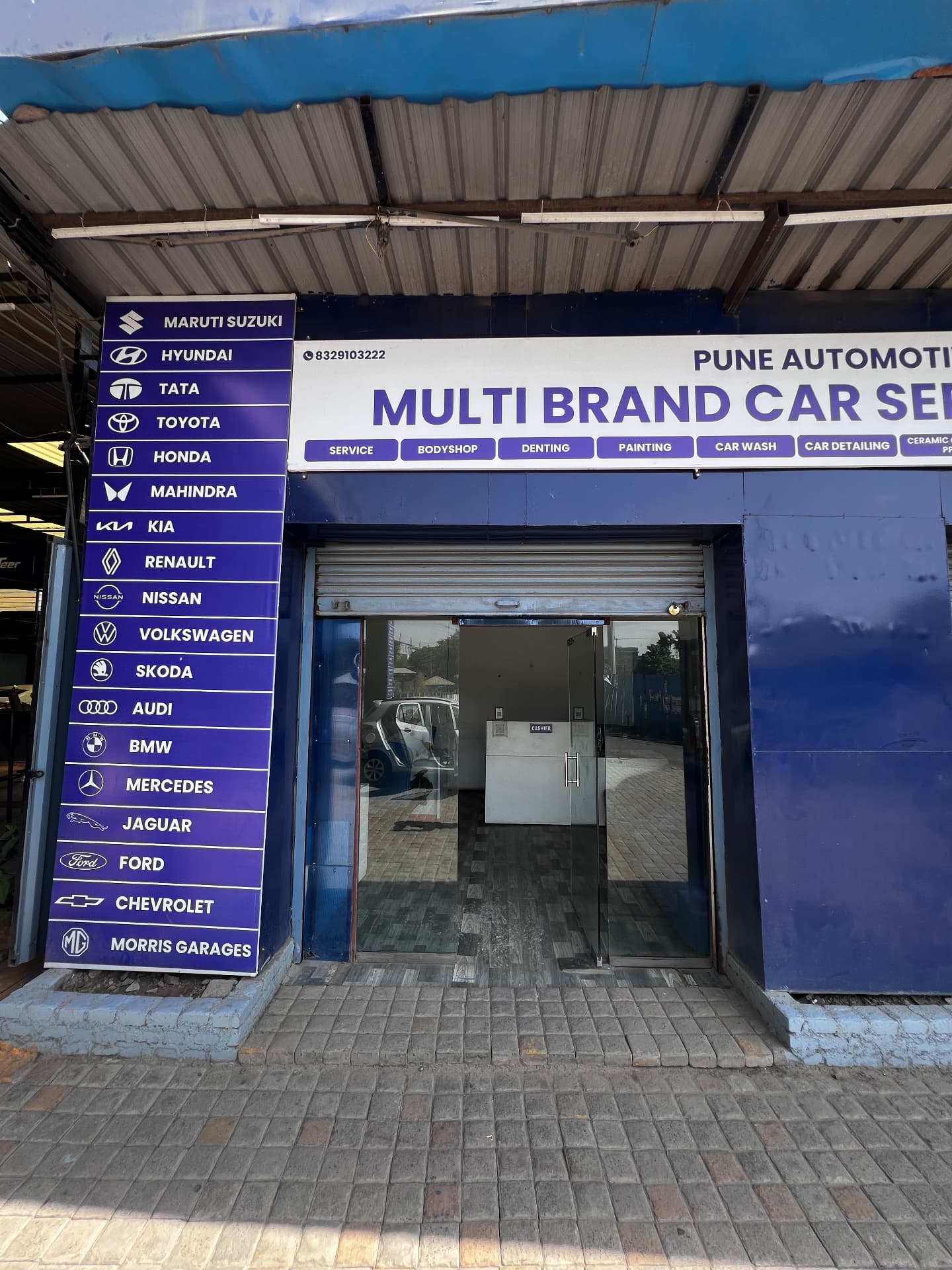 Brand board listing Maruti Suzuki, Hyundai, Tata, Toyota, Honda, Mahindra, Kia, Audi, BMW and Mercedes serviced at Pune Automotive